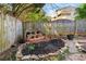 A peaceful flower bed adds charm to this backyard, featuring rocks and a wooden fence at 2804 Livsey Woods Dr, Tucker, GA 30084
