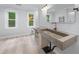 The bathroom features modern fixtures, a vessel sink, and a light wood toned floor at 2804 Livsey Woods Dr, Tucker, GA 30084