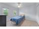 Bedroom with neutral walls, carpet, and a window providing natural light at 2804 Livsey Woods Dr, Tucker, GA 30084