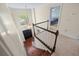 An open foyer with a staircase leading up to the upper level and a large window at 2804 Livsey Woods Dr, Tucker, GA 30084
