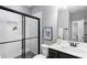 Bathroom features a glass-enclosed shower and dark vanity at 2528 Magnolia Ridge Dr, Marietta, GA 30067
