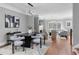 Contemporary dining area with stylish table, seating, and an adjacent living space at 2528 Magnolia Ridge Dr, Marietta, GA 30067
