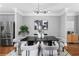 Dining area with modern lighting, hardwood floors, and stainless steel appliances at 2528 Magnolia Ridge Dr, Marietta, GA 30067