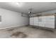 Spacious garage with an automatic overhead door and concrete flooring at 2528 Magnolia Ridge Dr, Marietta, GA 30067