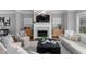 Open living area with a fireplace, decorative mantle, and plenty of seating at 2528 Magnolia Ridge Dr, Marietta, GA 30067