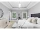 A luxurious main bedroom boasts natural lighting, tasteful furniture and decor at 2528 Magnolia Ridge Dr, Marietta, GA 30067