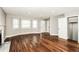 Sun-filled room with beautiful hardwood floors, grey walls, and an entryway, creating a warm atmosphere at 6331 Wedgeview Dr, Tucker, GA 30084