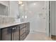 Elegant bathroom with double vanity, marble countertop, and glass enclosed shower at 190 Rolison Way, Fayetteville, GA 30214