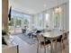 Bright and airy living room with large windows, modern decor, and hardwood floors at 190 Rolison Way, Fayetteville, GA 30214