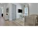 Bright office with large desk, grey accents, hardwood floors, and modern storage solutions for an inspiring workspace at 190 Rolison Way, Fayetteville, GA 30214