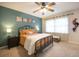 Relaxing bedroom featuring a queen-sized bed, stylish wall decor, and soft lighting for a peaceful atmosphere at 2232 Dunseath Ave # 407, Atlanta, GA 30318
