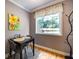 Charming dining area with a small table set by a window, perfect for enjoying meals with a view at 2232 Dunseath Ave # 407, Atlanta, GA 30318