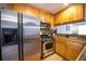 Efficient kitchen featuring stainless steel appliances, light wood cabinetry, and durable countertops at 2232 Dunseath Ave # 407, Atlanta, GA 30318