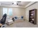 Comfortable bonus room with a sofa, bookcase, and plenty of natural light at 854 Club Moss Ct, Marietta, GA 30068
