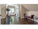 Spacious bonus room with hard wood floors, plenty of light, exercise equipment and stylish decor at 854 Club Moss Ct, Marietta, GA 30068