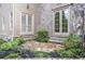 Exterior shot of a home with French doors and stone accents at 854 Club Moss Ct, Marietta, GA 30068