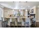 Stylish kitchen with granite counters, pendant lighting, island seating, and stainless steel appliances at 854 Club Moss Ct, Marietta, GA 30068