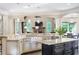 Bright and spacious kitchen with granite counters, large island, farmhouse sink, and breakfast nook at 854 Club Moss Ct, Marietta, GA 30068