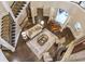 Aerial view of living room with grand piano and staircase in a beautiful home at 854 Club Moss Ct, Marietta, GA 30068