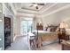 Beautiful bedroom with tray ceiling, french doors to balcony, and built-in bookcase at 854 Club Moss Ct, Marietta, GA 30068