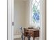 Charming office nook with desk and diamond window offers a quiet workspace at 854 Club Moss Ct, Marietta, GA 30068