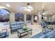 Spacious covered patio with comfortable seating, overlooking the pool and lush backyard at 854 Club Moss Ct, Marietta, GA 30068