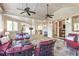 Spacious sunroom provides a relaxing retreat with ample seating and an abundance of natural light at 854 Club Moss Ct, Marietta, GA 30068