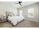 Calm bedroom with neutral tones, a large bed, and shuttered windows for natural light at 920 Wemberley Ln, Marietta, GA 30064