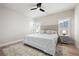 A serene bedroom with a plush bed, neutral tones, and plantation shutters at 920 Wemberley Ln, Marietta, GA 30064