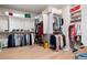 Walk-in closet with custom shelving, hanging racks, and ample storage space for clothes and accessories at 920 Wemberley Ln, Marietta, GA 30064