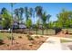 Community dog park with green space and secure fencing, perfect for pet owners to exercise their dogs at 920 Wemberley Ln, Marietta, GA 30064