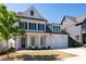 Charming two-story home with covered front porch and two-car garage at 920 Wemberley Ln, Marietta, GA 30064