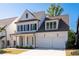 Charming two-story home with covered front porch and two-car garage at 920 Wemberley Ln, Marietta, GA 30064