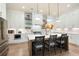 Gourmet kitchen with white cabinetry, quartz countertops, stainless steel appliances, and a stylish island at 920 Wemberley Ln, Marietta, GA 30064