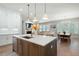 Spacious kitchen with stainless steel appliances that opens to dining and living room creating a great living space at 920 Wemberley Ln, Marietta, GA 30064