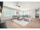 Bright living room featuring hardwood floors, lots of natural light and a comfortable couch at 920 Wemberley Ln, Marietta, GA 30064