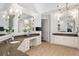 Bathroom featuring double sinks with granite countertops and ample cabinet space at 1319 Glen Cedars Dr, Smyrna, GA 30126