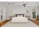 Spacious bedroom with neutral colors, a ceiling fan, and hardwood floors at 1319 Glen Cedars Dr, Smyrna, GA 30126