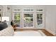 Bright bedroom with large windows overlooking the well-maintained backyard at 1319 Glen Cedars Dr, Smyrna, GA 30126