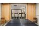 Bright game room with sliding barn doors leading to a theater room at 1319 Glen Cedars Dr, Smyrna, GA 30126