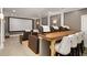 Home theater with tiered seating, bar, and large screen for immersive entertainment at 1319 Glen Cedars Dr, Smyrna, GA 30126