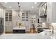 Spacious kitchen with white cabinets, stainless steel appliances, and an island at 1319 Glen Cedars Dr, Smyrna, GA 30126
