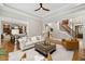 Spacious living room with hardwood floors, a fireplace, and an open floor plan at 1319 Glen Cedars Dr, Smyrna, GA 30126