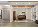 Charming home office with custom built-ins, beamed ceilings, and natural light at 1319 Glen Cedars Dr, Smyrna, GA 30126