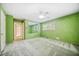 Bright bedroom with a view of a mirror, a ceiling fan, and a closet for storage at 1478 Biltmore Ne Dr, Atlanta, GA 30329