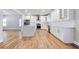 Gourmet kitchen with stainless steel appliances, a center island, and seamless flow to the living area at 870 Gaston Sw St, Atlanta, GA 30310