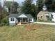 Charming renovated home with a covered front porch and a long driveway at 1841 Bayberry Sw Dr, Atlanta, GA 30311