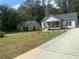 Charming home with a well-maintained front yard and driveway at 1841 Bayberry Sw Dr, Atlanta, GA 30311