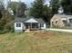 Charming renovated bungalow with a welcoming front porch and freshly seeded front yard at 1841 Bayberry Sw Dr, Atlanta, GA 30311