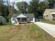 Charming renovated bungalow with a welcoming front porch and freshly seeded front yard at 1841 Bayberry Sw Dr, Atlanta, GA 30311